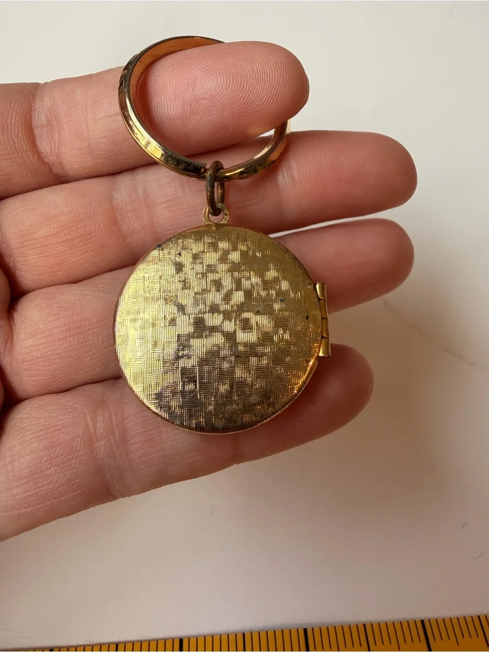 Gold-Tone Round Locket Pendant with Crystal Halo